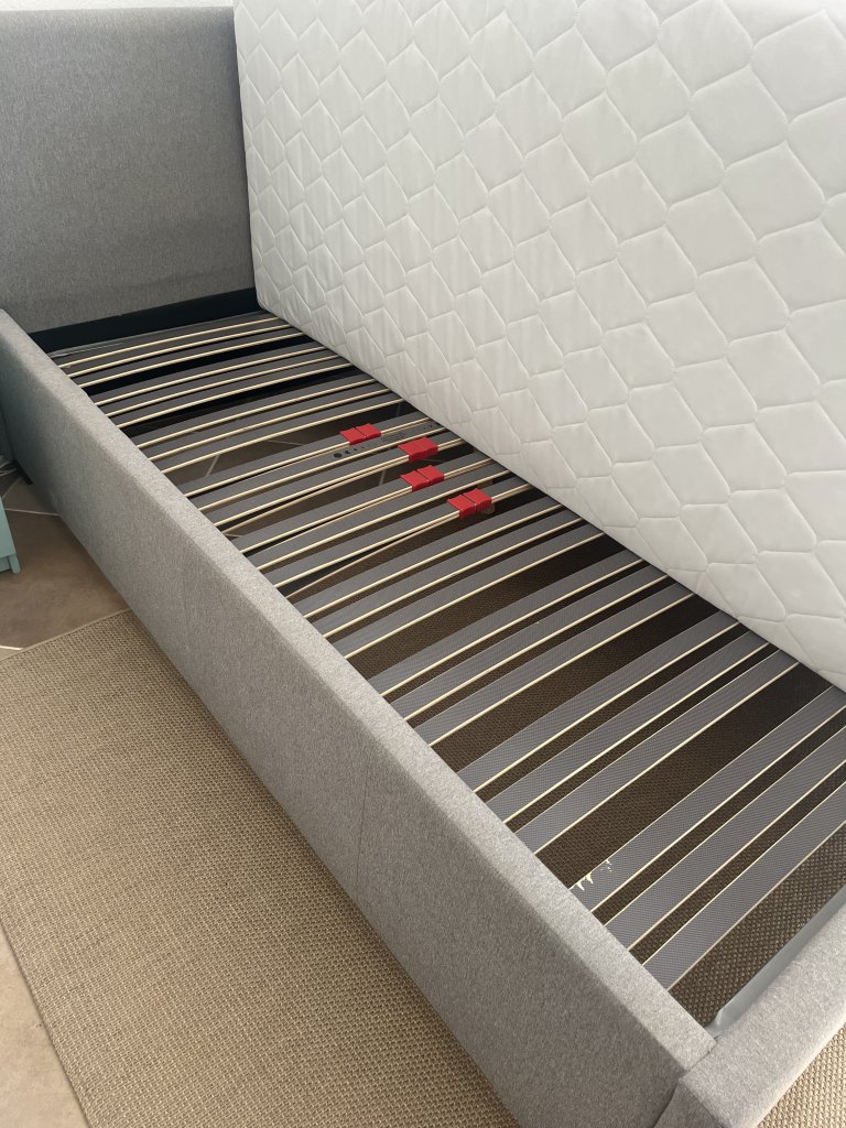 Gray upholstered bed
