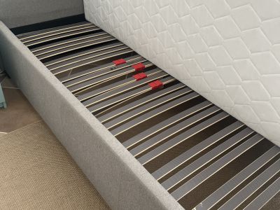 Gray upholstered bed