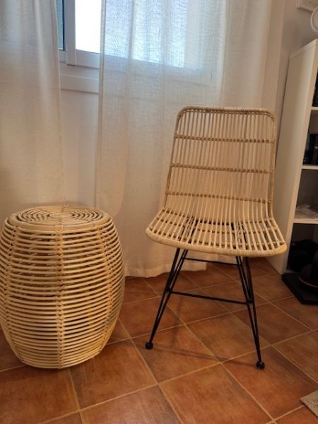 Rattan chair and small round rattan table