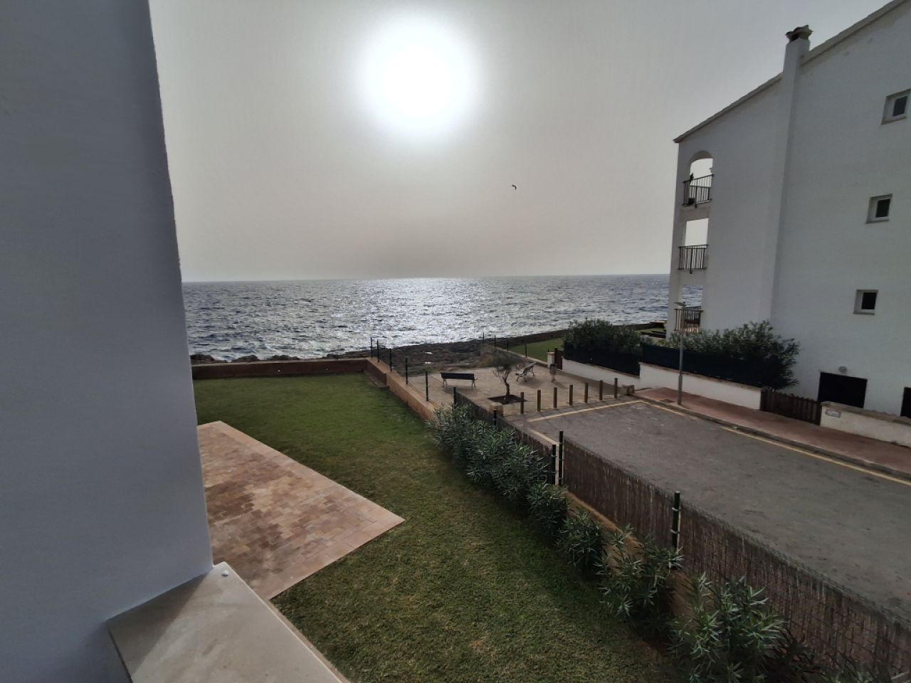 SEASON 26/27: Large apartment with communal pool on the first line of the coast of Portocolom -- AP 403aT