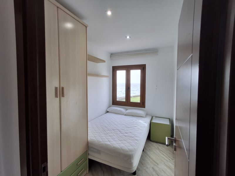 SEASON 26/27: Large apartment with communal pool on the first line of the coast of Portocolom -- AP 403aT