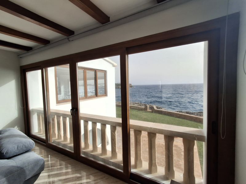 SEASON 26/27: Large apartment with communal pool on the first line of the coast of Portocolom -- AP 403aT