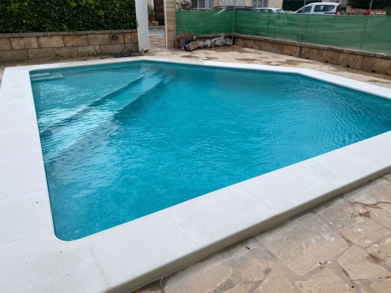 SEASON 26/27: Large apartment with communal pool on the first line of the coast of Portocolom -- AP 403aT