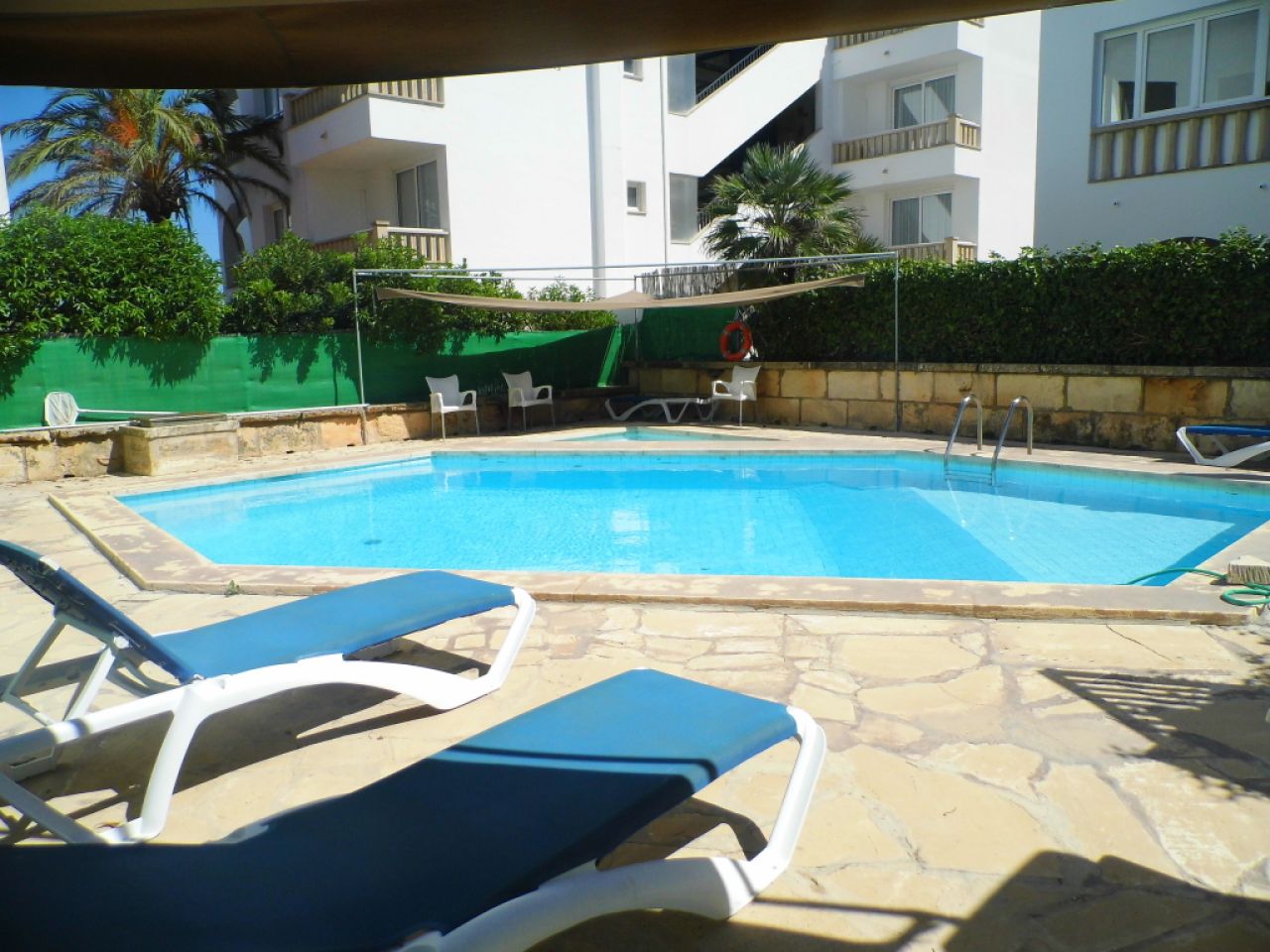 SEASON 26/27: Large apartment with communal pool on the first line of the coast of Portocolom -- AP 403aT