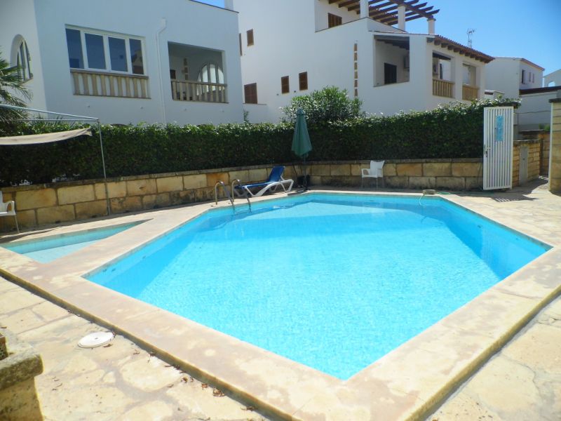 SEASON 26/27: Large apartment with communal pool on the first line of the coast of Portocolom -- AP 403aT