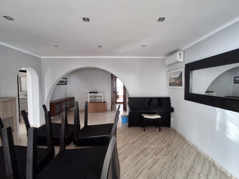 SEASON 26/27: Large apartment with communal pool on the first line of the coast of Portocolom -- AP 403aT