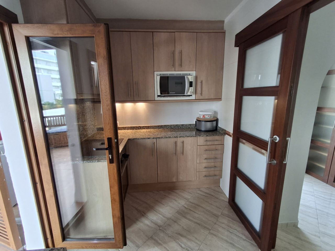 SEASON 26/27: Large apartment with communal pool on the first line of the coast of Portocolom -- AP 403aT