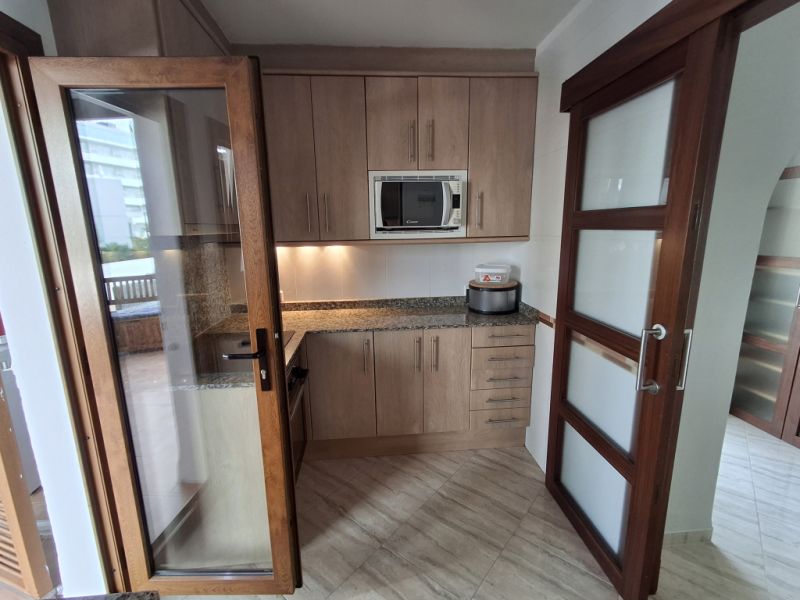 SEASON 26/27: Large apartment with communal pool on the first line of the coast of Portocolom -- AP 403aT