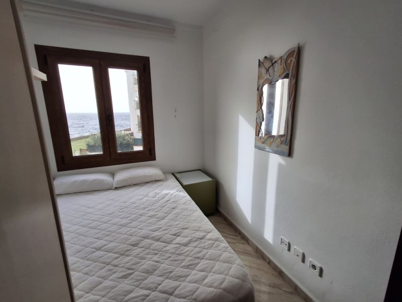 SEASON 26/27: Large apartment with communal pool on the first line of the coast of Portocolom -- AP 403aT