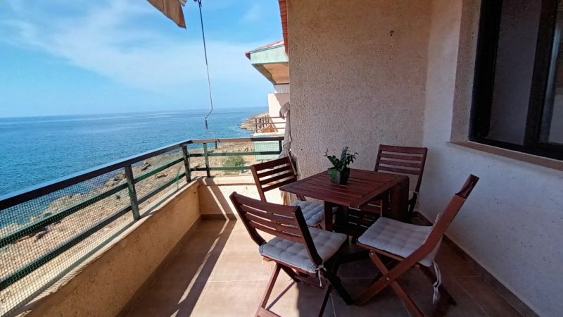 Season 26/27: Modern apartment in first line of the coast of St Jordi --- AP 10 T