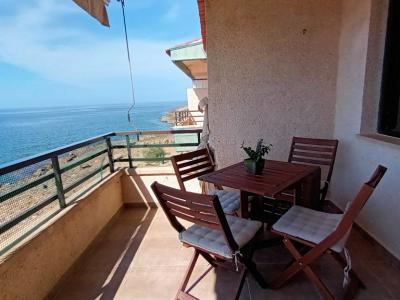 Season 26/27: Modern apartment in first line of the coast of St Jordi --- AP 10 T