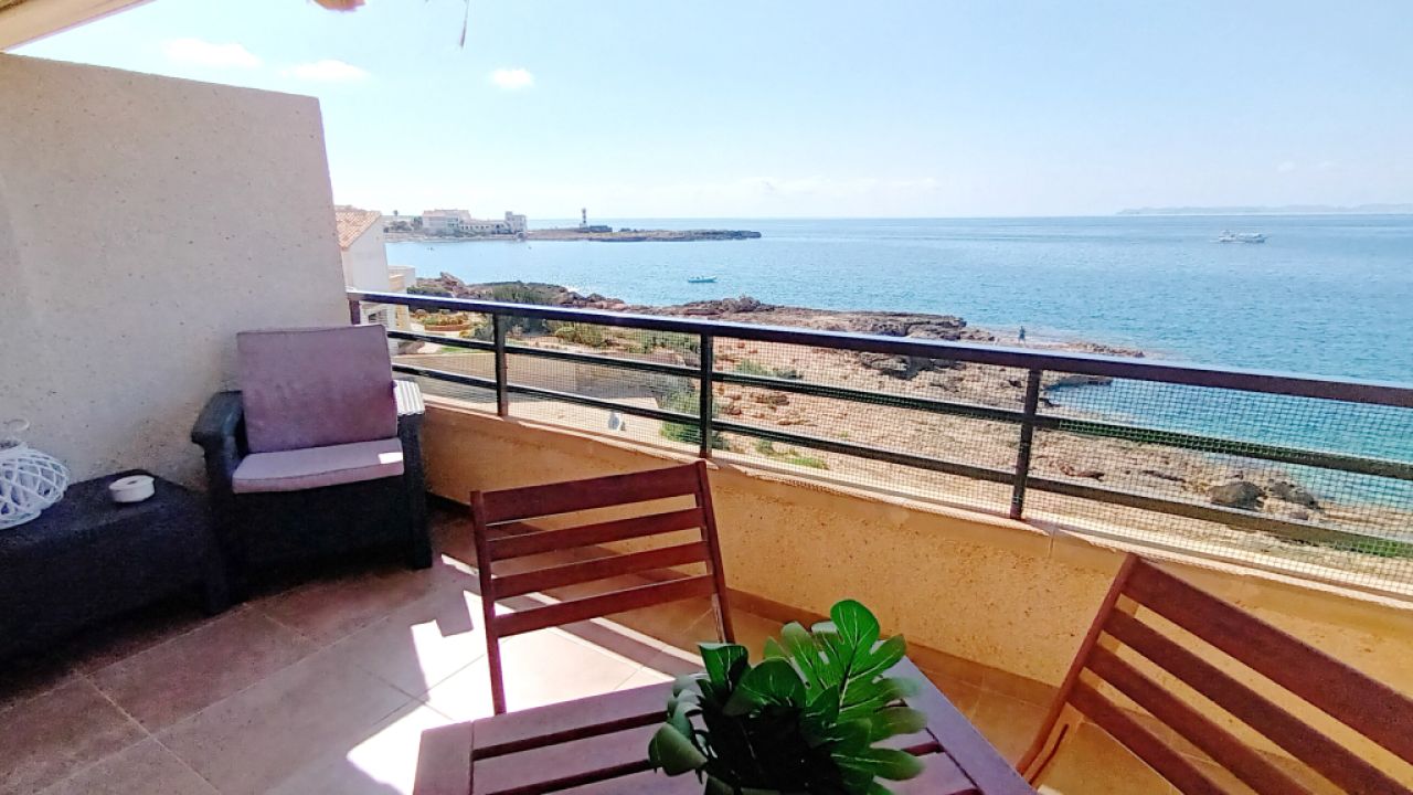 Season 26/27: Modern apartment in first line of the coast of St Jordi --- AP 10 T