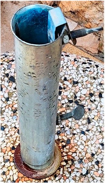 Round umbrella stand made of concrete and stainless steel tube with new sun umbrella