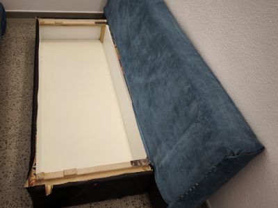 Sofá cama en azul turquesa