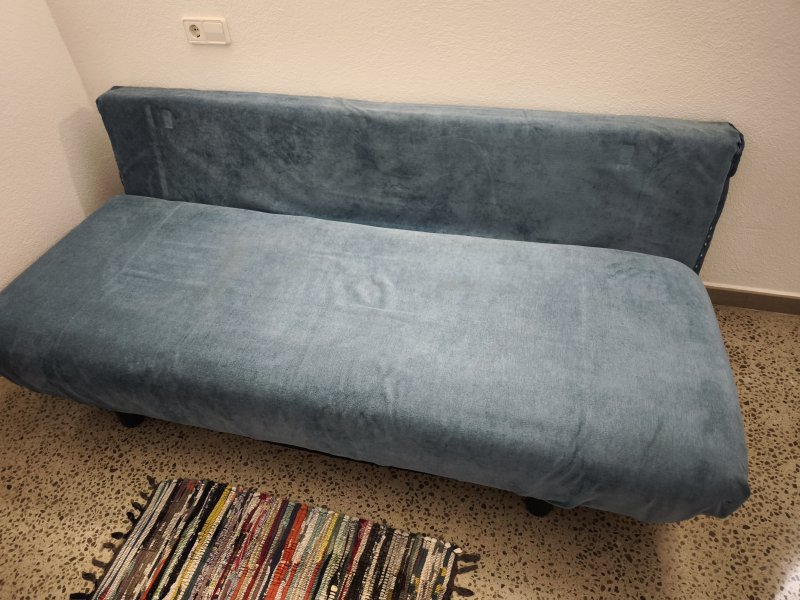 Sofá cama en azul turquesa
