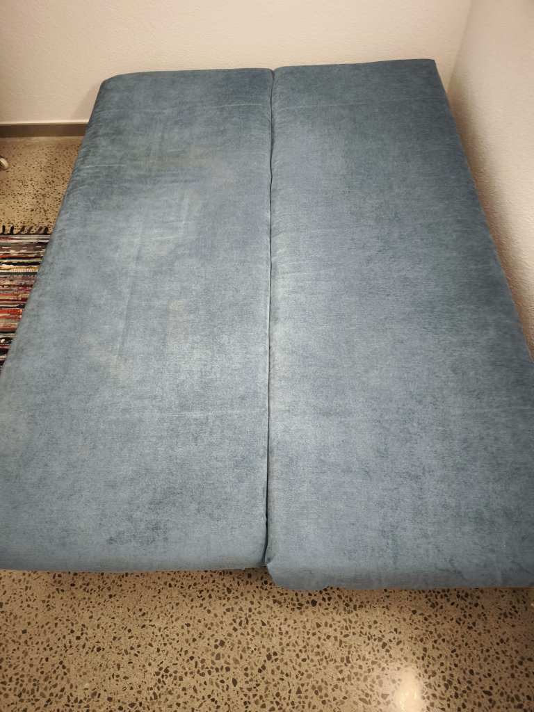 Sofá cama en azul turquesa