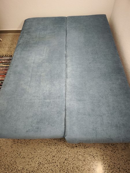 Sofá cama en azul turquesa