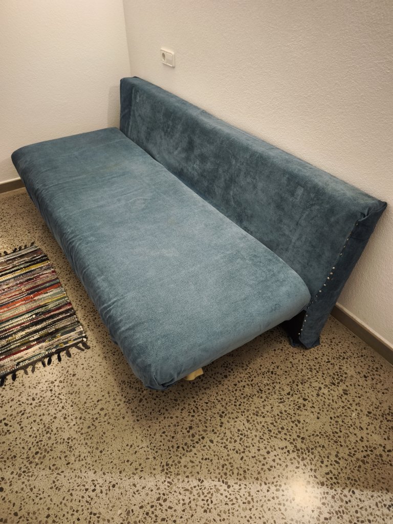 Sofá cama en azul turquesa