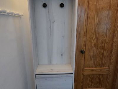 Schmale Flurgarderobe / Schuhschrank in Holzoptik (2,25m x 0,58m)