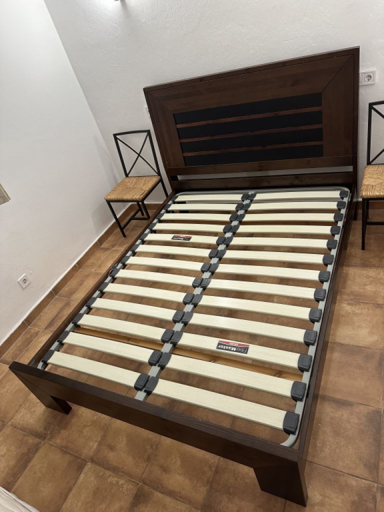Beautiful wooden bed including slatted frame for sale