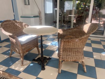 Set mit 4 Rattansesseln