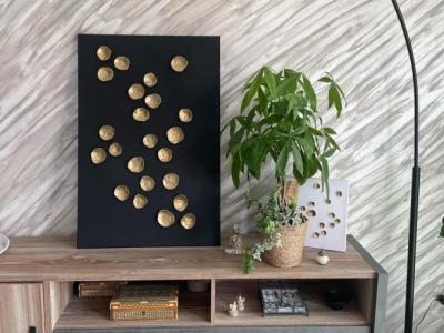 Pieza única en negro/dorado