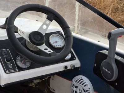 Vendo mi barco con motor y remolque