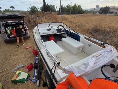 Vendo mi barco con motor y remolque