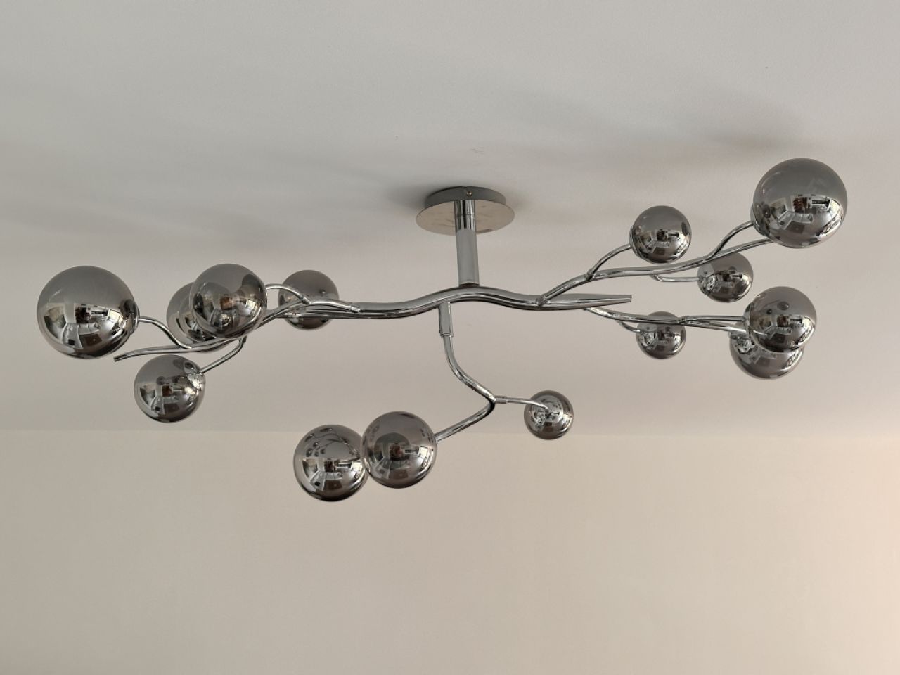 Selling my high-quality designer ceiling light in a modern chrome design.
