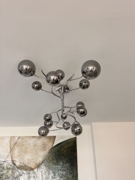 Selling my high-quality designer ceiling light in a modern chrome design.