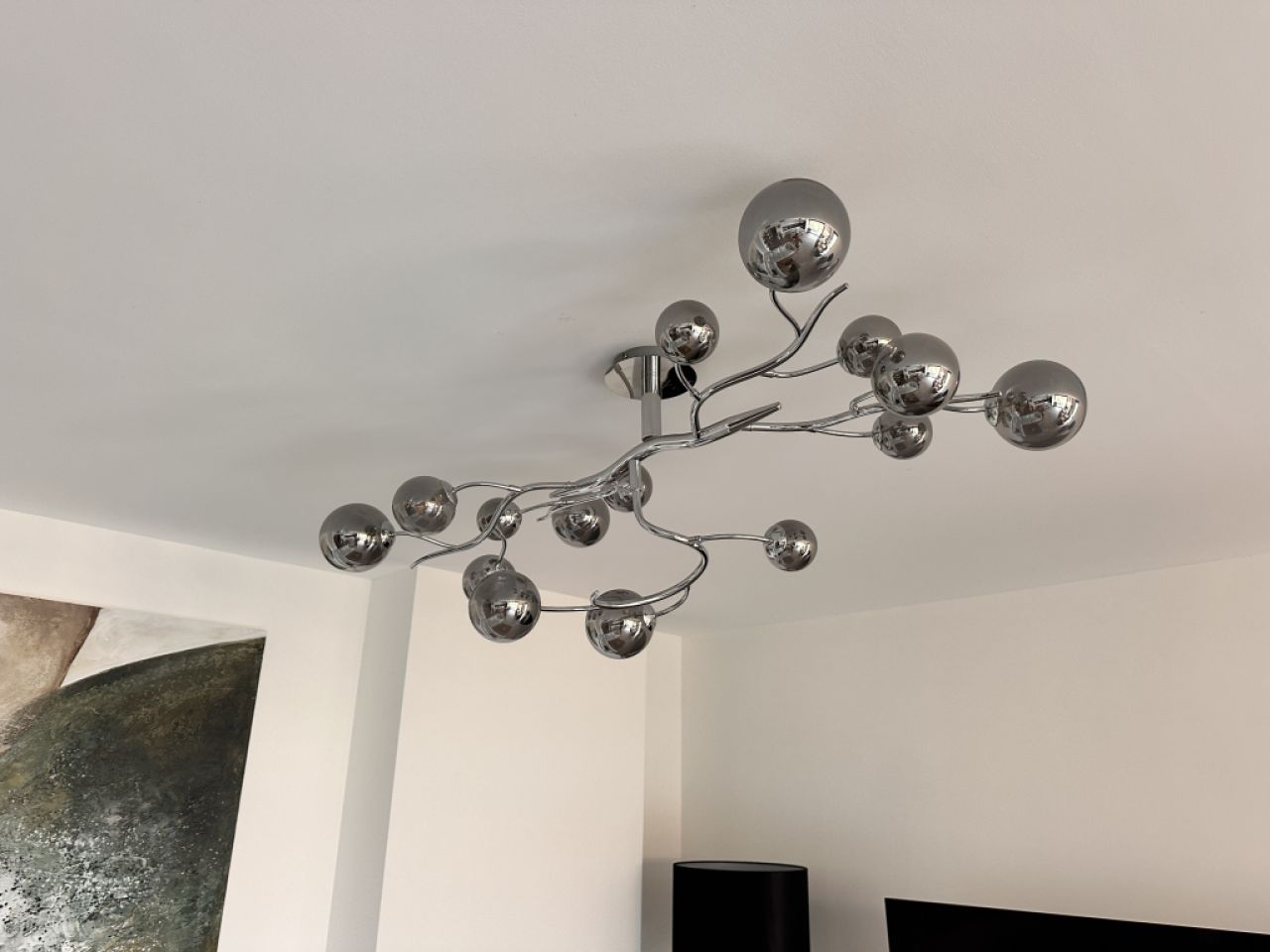 Selling my high-quality designer ceiling light in a modern chrome design.