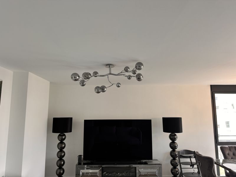 Selling my high-quality designer ceiling light in a modern chrome design.