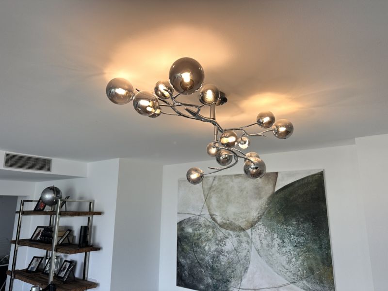 Selling my high-quality designer ceiling light in a modern chrome design.