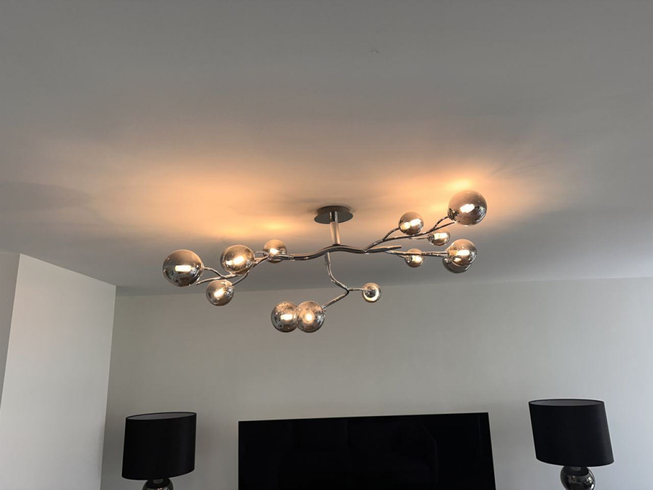 Selling my high-quality designer ceiling light in a modern chrome design.