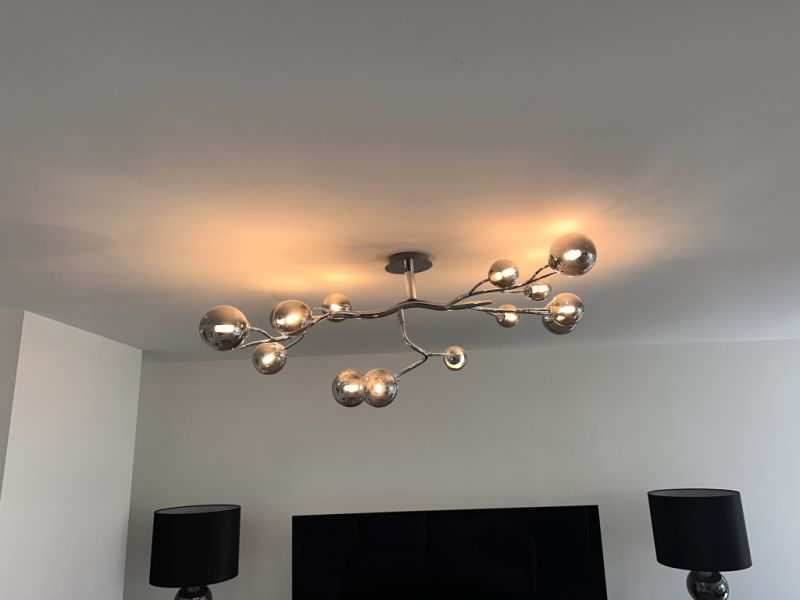 Selling my high-quality designer ceiling light in a modern chrome design.