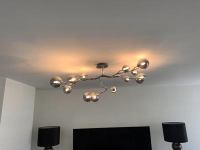 Selling my high-quality designer ceiling light in a modern chrome design.