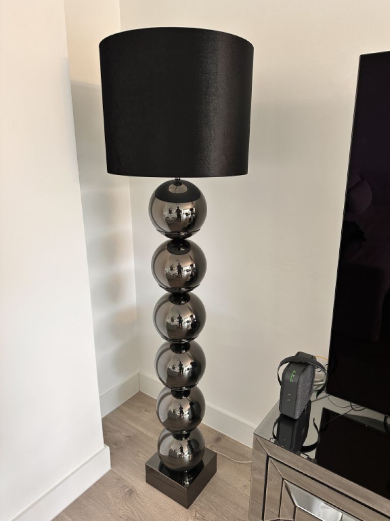 Selling two high-quality designer floor lamps in a modern, elegant style.