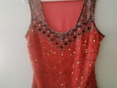 Various blouses and 1 leather dress