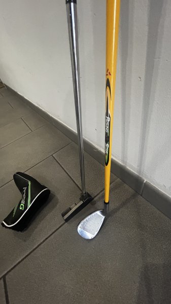 Verschiedene Golf Schläger, Erwachsene und Kind
