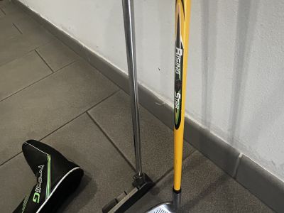 Verschiedene Golf Schläger, Erwachsene und Kind