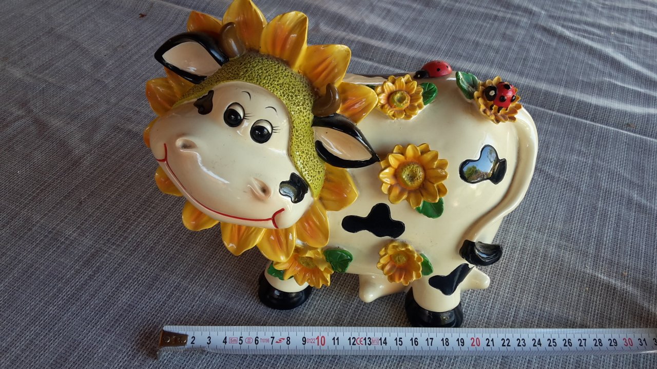 Various cow-shaped piggy banks  original decoration & gift idea