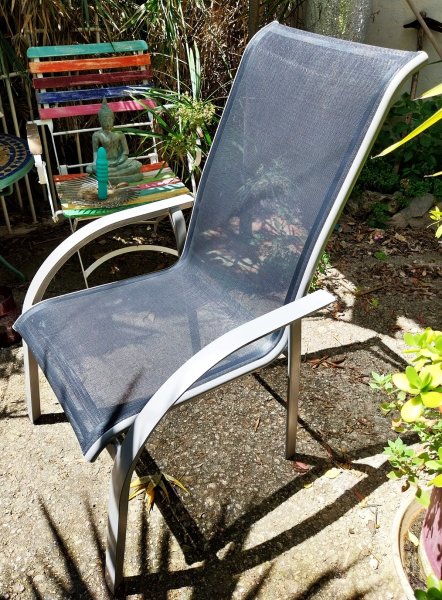 Four Kettal terrace chairs