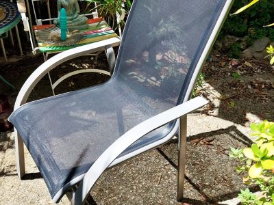 Four Kettal terrace chairs