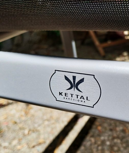 Four Kettal terrace chairs