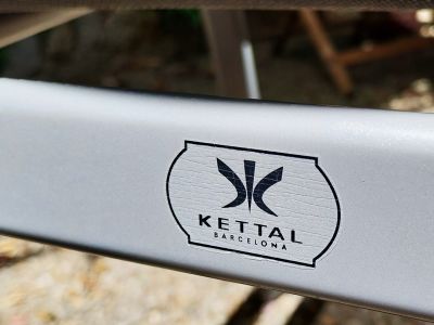 Four Kettal terrace chairs