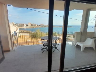 Invierno: Apartamento con ascensor en 1ª línea de la bahía de Gayota en Colonia St Jordi -- AP 15 WT