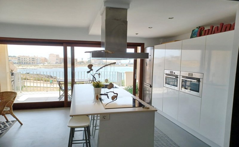 Invierno: Apartamento con ascensor en 1ª línea de la bahía de Gayota en Colonia St Jordi -- AP 15 WT